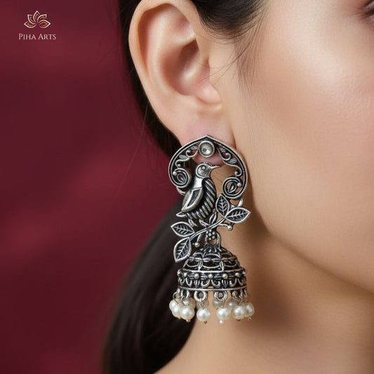Handcrafted Bird and Leaf Motif Oxidized Silver Jhumka Earrings