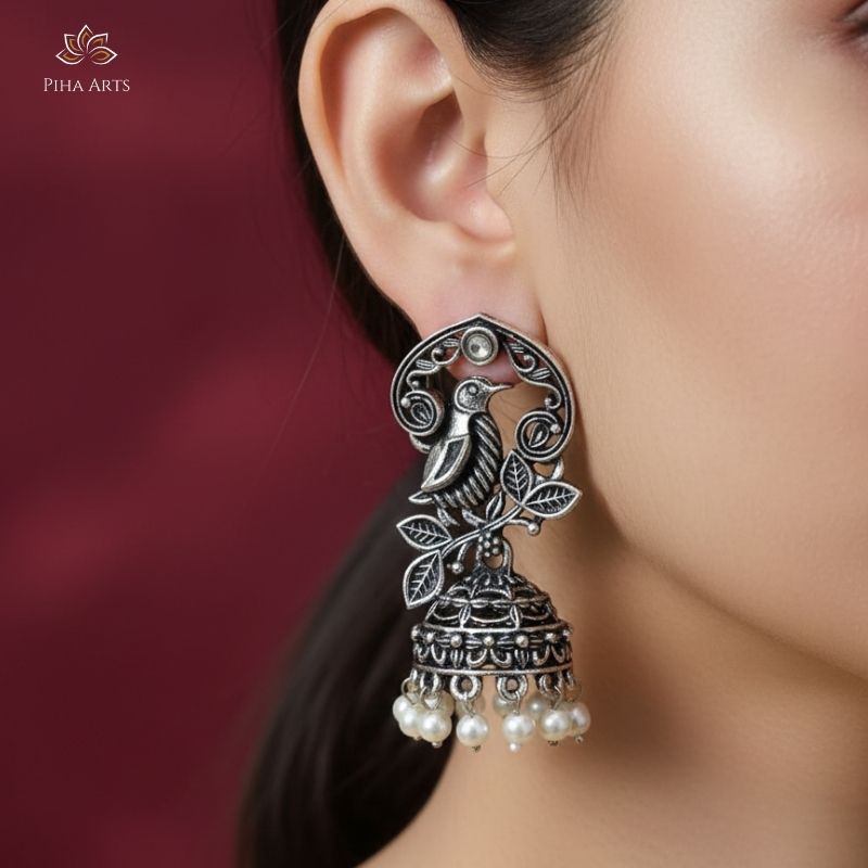 Handcrafted Bird and Leaf Motif Oxidized Silver Jhumka Earrings