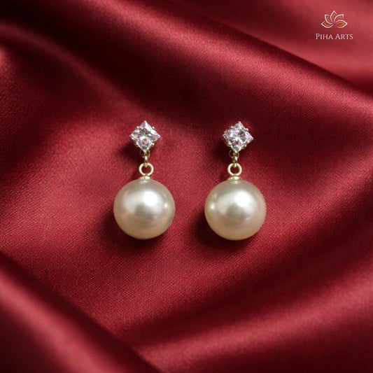 Elegant Gold Toned Pearl Drop Earrings with Square Crystal