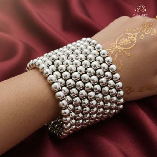 Oxidised Silver Spiral Bangle with Full Bead Design